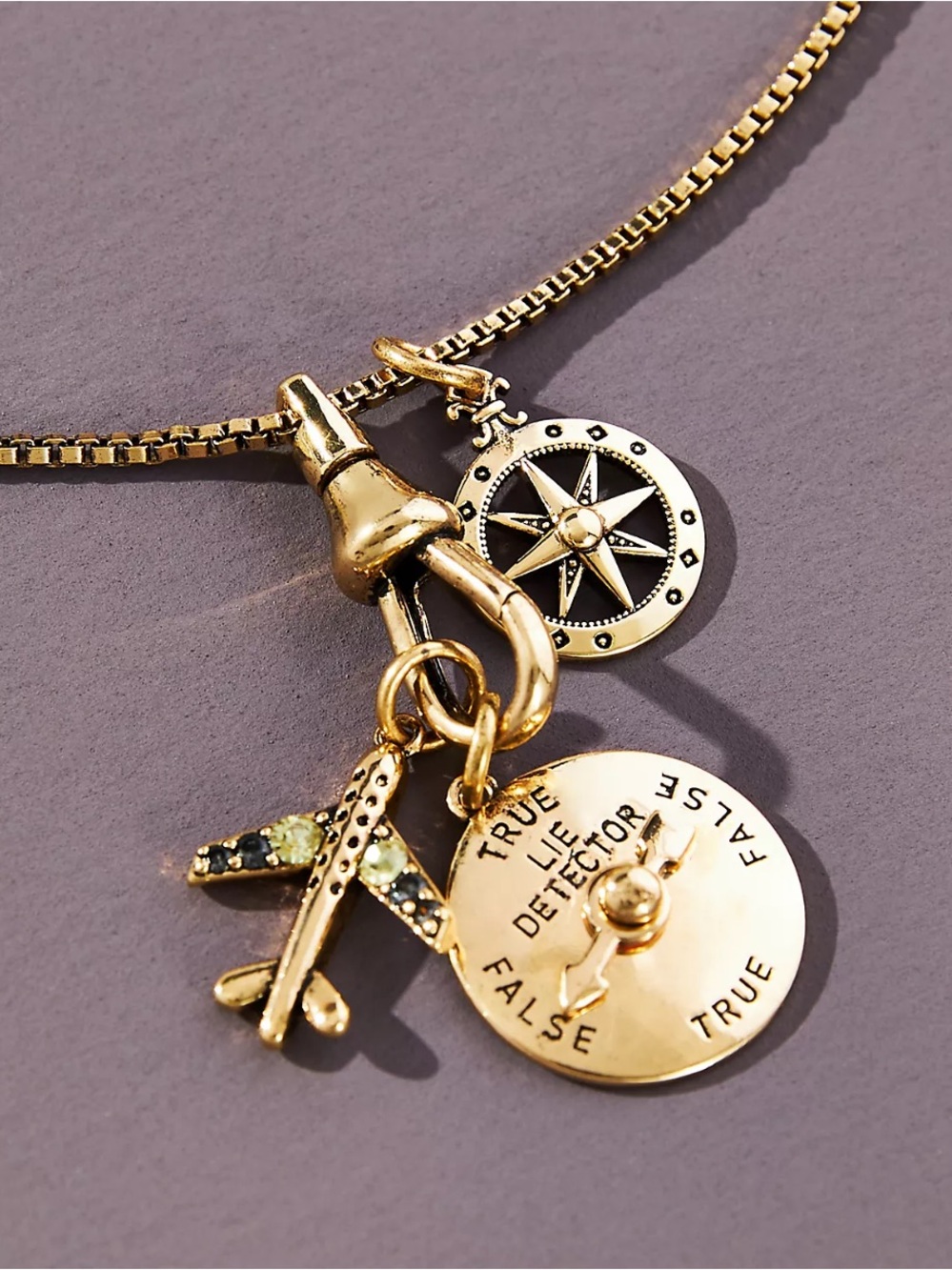 Anthropologie travel gold-Tone Compass, Airplane & Spinning Disc Charm Necklac
